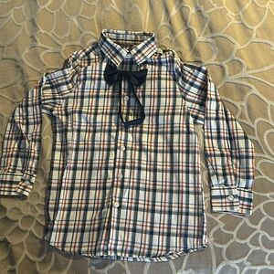 Long sleeved button up shirt with bow tie